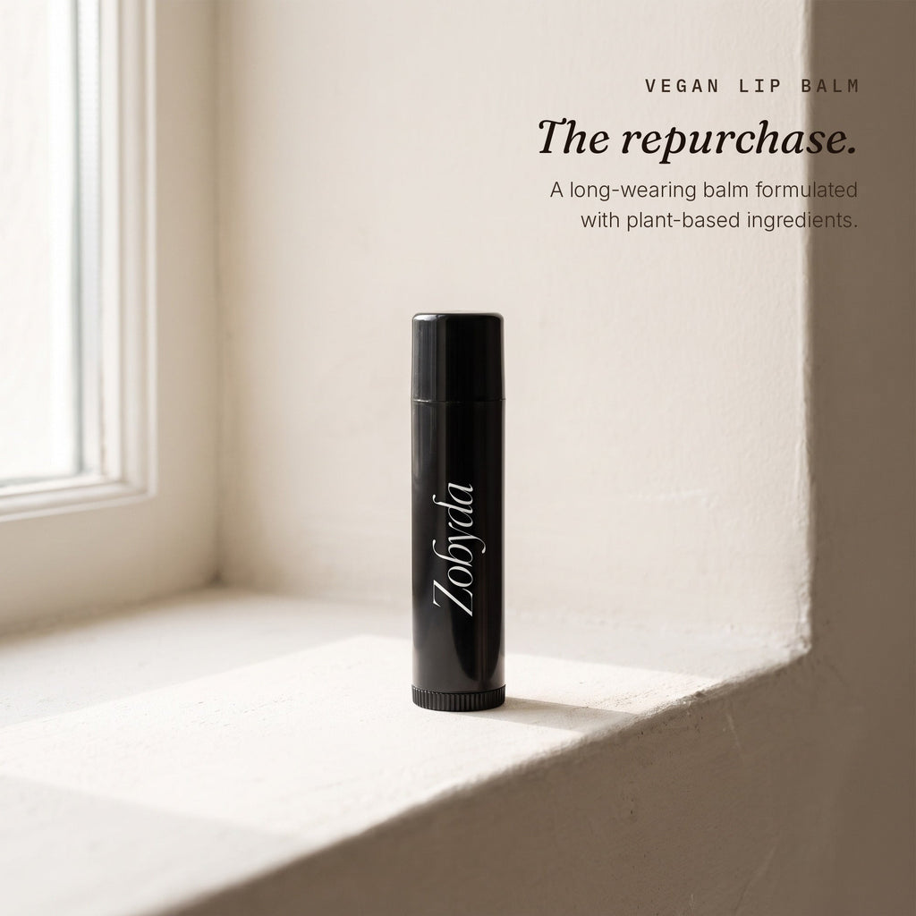 Zobyda Vegan Lip Balm tube on a sunlit windowsill