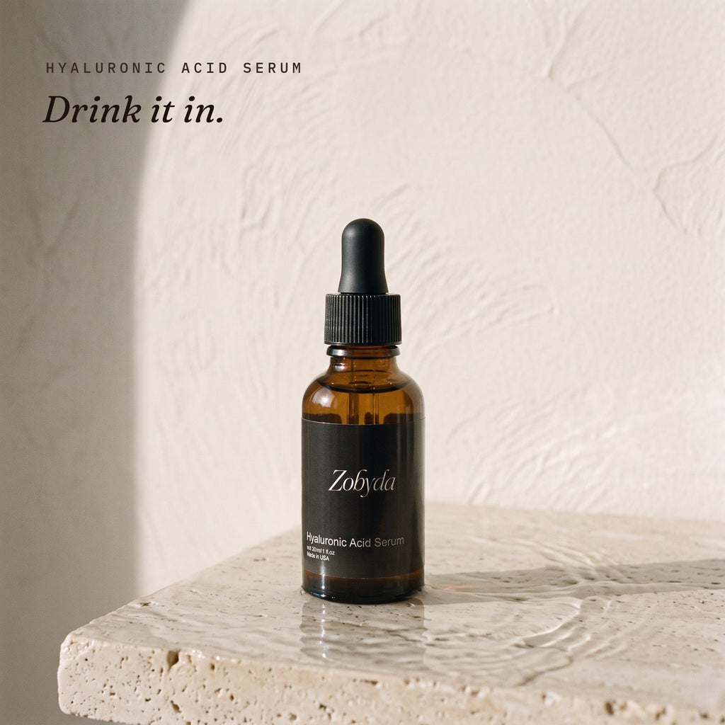 Zobyda Hyaluronic Acid Serum 30ml bottle on wet travertine stone