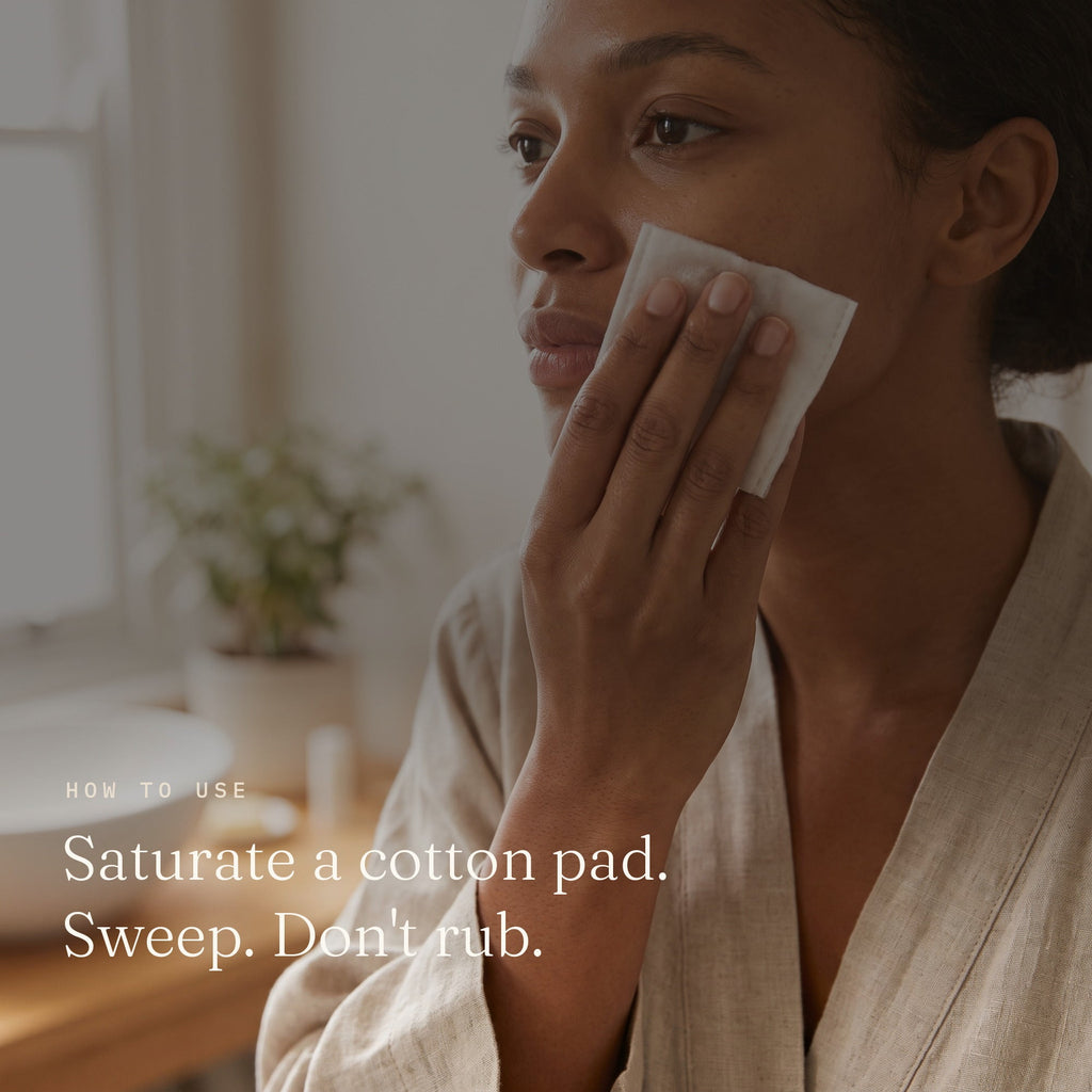 Woman using Zobyda Makeup Remover Solution with a cotton pad