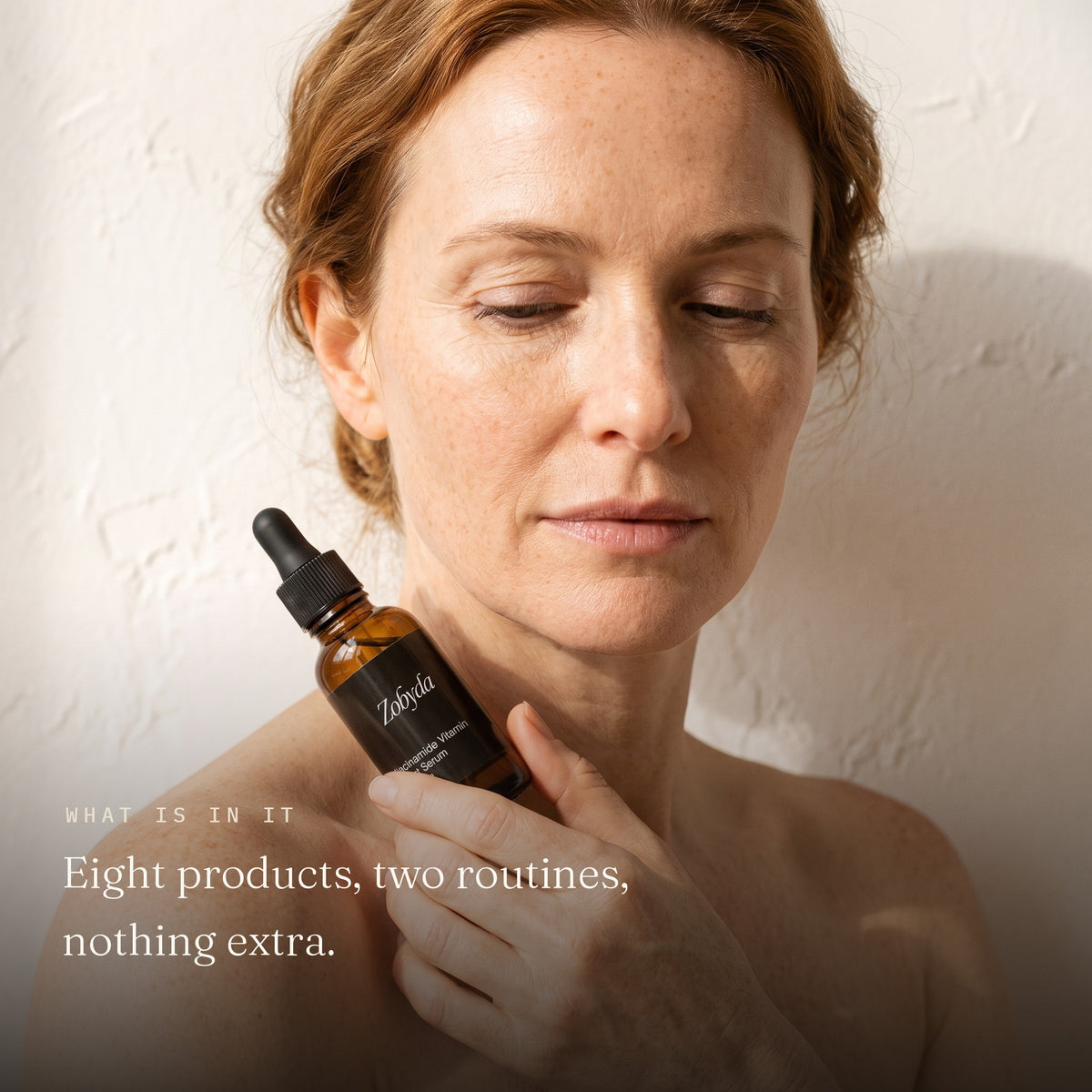 Woman holding the Zobyda Niacinamide Vitamin Boost Serum: eight products, two routines, nothing extra