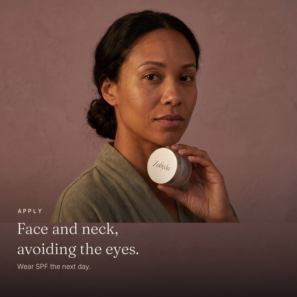 Woman holding the Zobyda Night Renewal Creme jar: apply to face and neck, avoiding the eyes